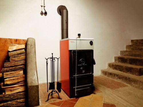 Котлы длительного горения на дровах для дома: особенности и принцип работы
